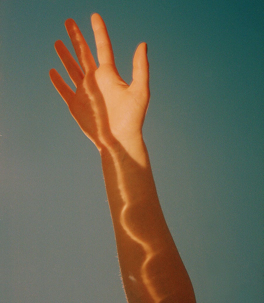 Hand in the shadow
