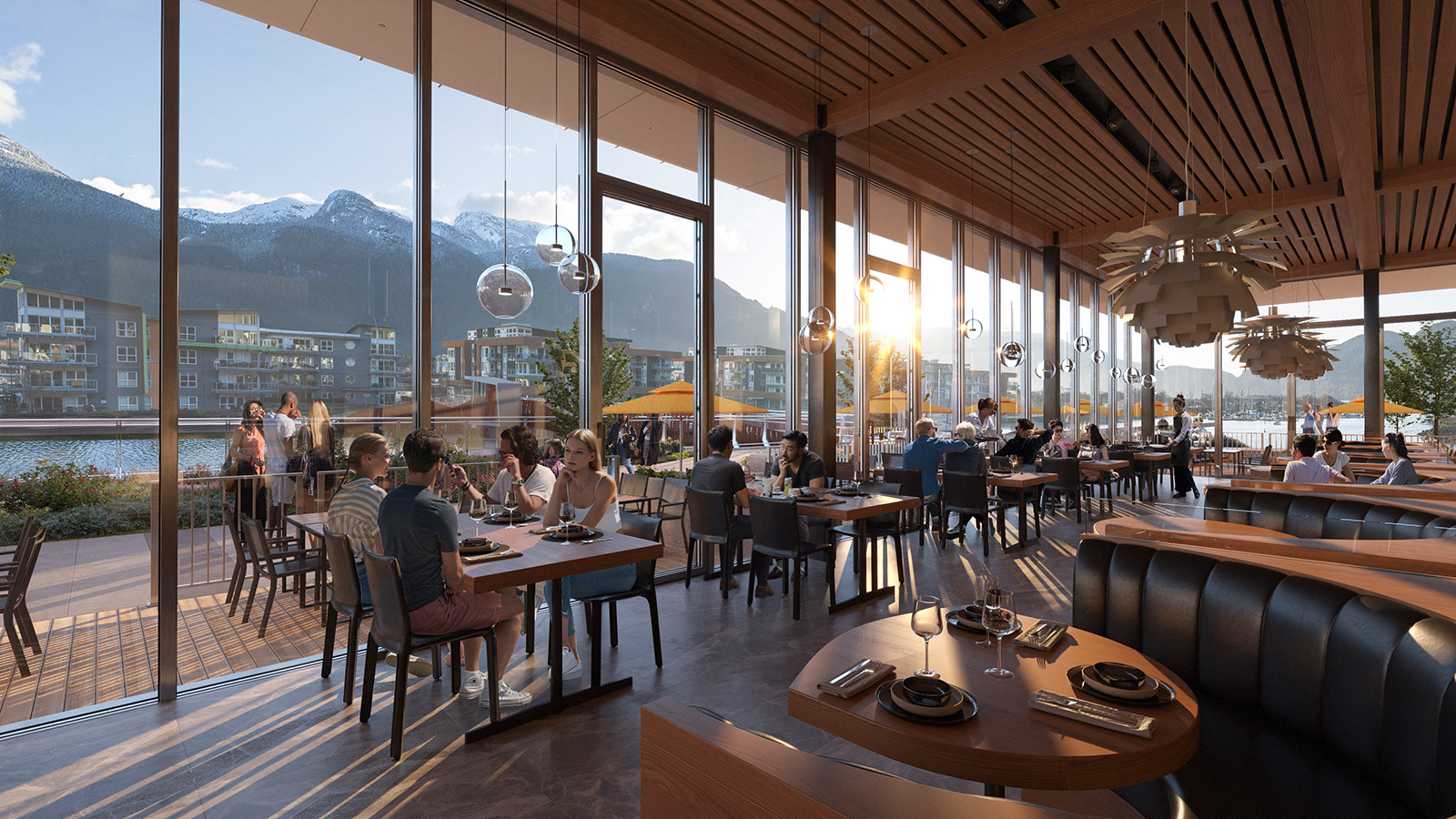 People in a restaurant with views of the mountains